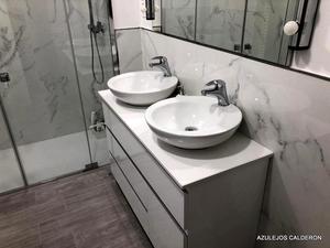 VISTA LATERAL DE MUEBLE DE BAÑO C/ DOS LAVABOS REDONDOS DE SOBRE ENCIMERA 