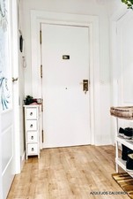 PANELADO DE PUERTA ACORAZADA A JUEGO CON EL RESTO DE PUERTAS LACADAS EN BLANCO