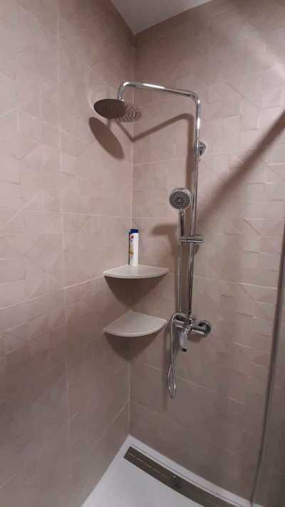DESPUÉS REFORMA COLUMNA ESPEJO  BAÑO MUEBLE SUELO LAVABO HIDROMASAJE PAREDES GIJÓN ASTURIAS OVIEDO